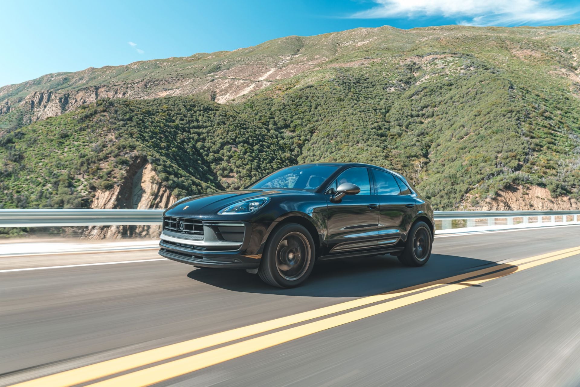 Black Macan T on a Road