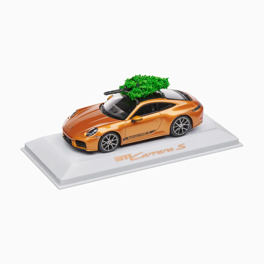 Nordic Gold Porsche 911 Carrera S scale model with a tree on the roof