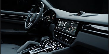 Couple Driving Porsche Cayenne in Sugar Land TX